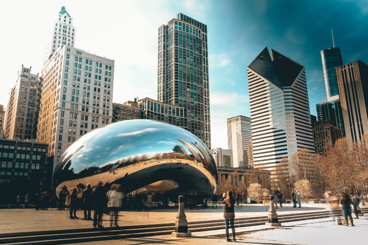 cloud gate in millennium park, reflecting everything in front of it