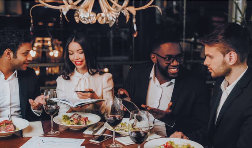 Business people having a dinner and chatting